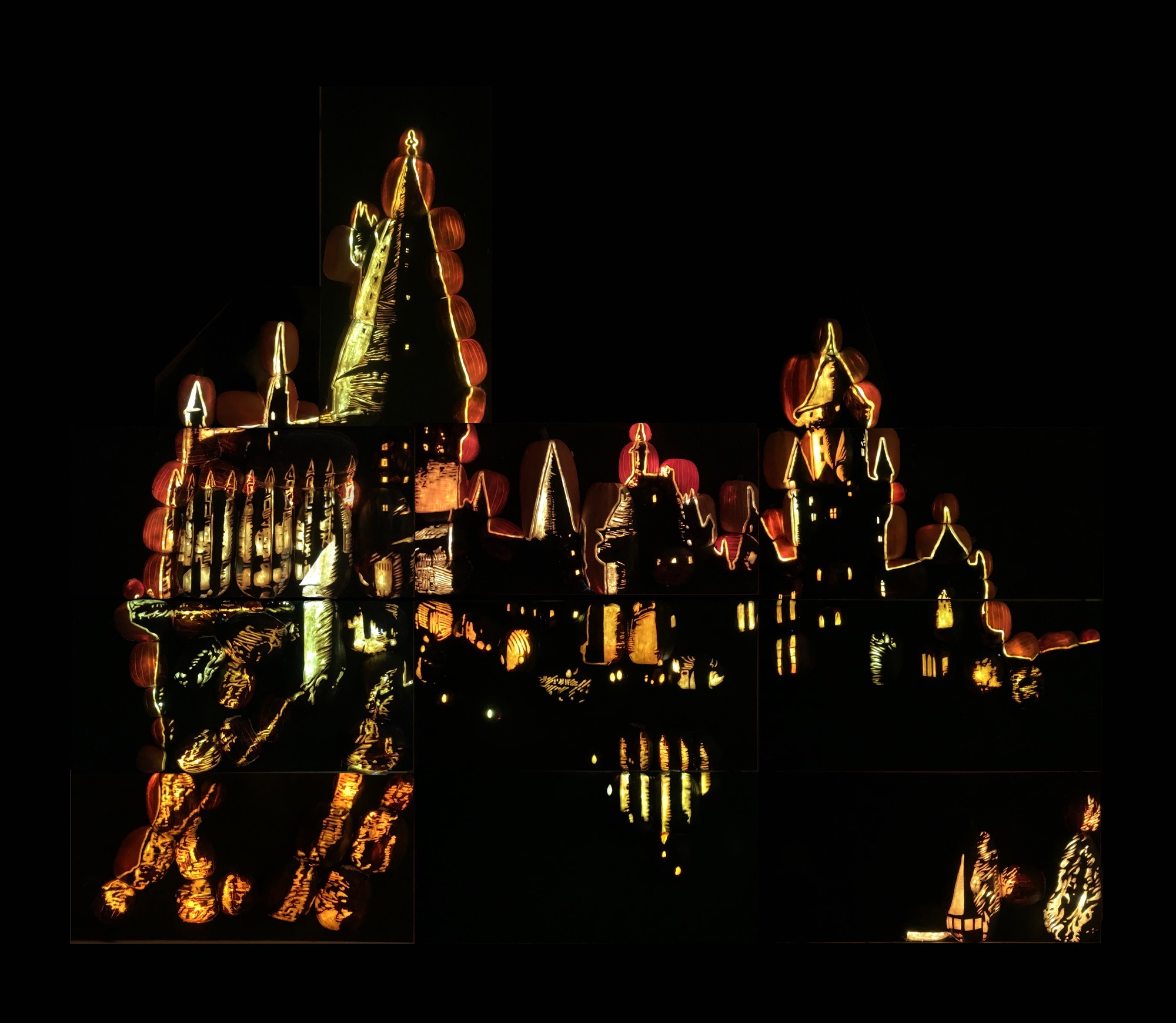 Pumpkin castle lit at night